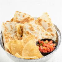 Quesadilla · 13 inch flour tortilla grilled and filled with your favorite protein, melted cheese, onion, ...