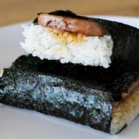 Spam Musubi · Grilled spam, rice, and teriyaki sauce wrapped in seaweed.