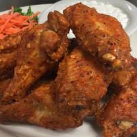 Piece Wings (10) · Spicy . BBQ. or lemon Pepper  Comes with one dipping sauce.