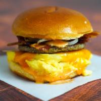 Big Breakfast Sammy  · 2 fresh cracked cage-free scrambled eggs, melted Cheddar cheese, bacon, breakfast sausage, g...