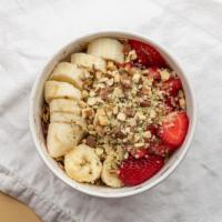 Tiki Bowl · Blended: acai, banana, mango, kiwi & apple juice toppings banana, strawberries, almonds, hem...