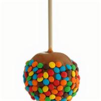 Caramel Apple Featuring M&M’S® · Caramel-covered Granny Smith apple rolled in M&M’s® candies. Serving size: 1/2 apple. Orderi...