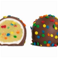 Birthday Cake Truffle · White chocolate birthday cake flavored center with colorful sprinkles in a milk chocolate sh...