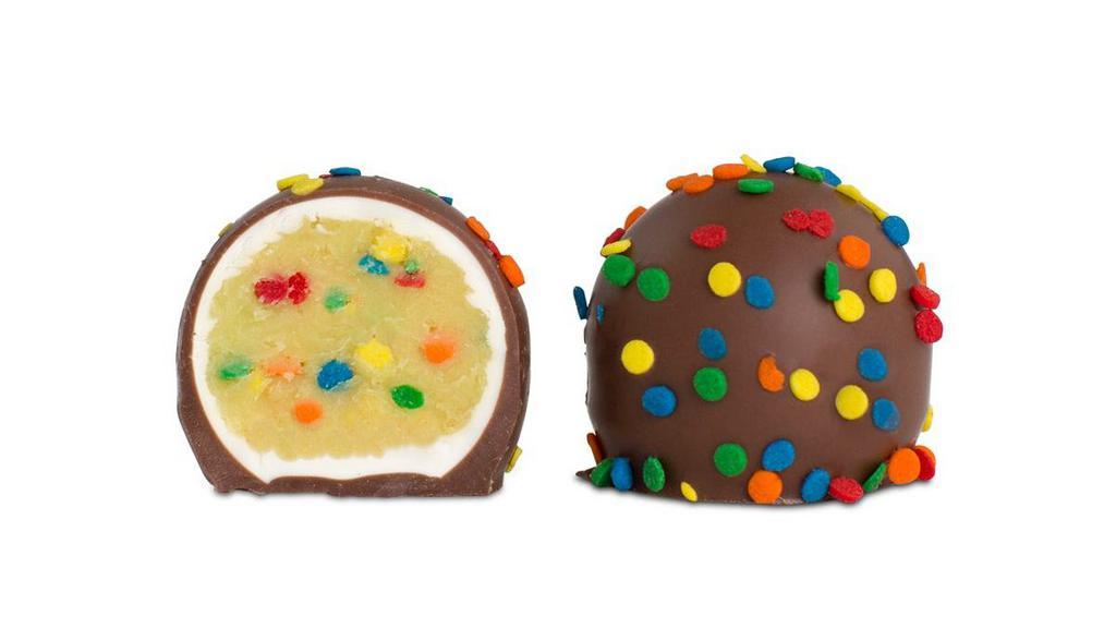 Birthday Cake Truffle · White chocolate birthday cake flavored center with colorful sprinkles in a milk chocolate shell and topped with the same bright sprinkles. Serving size: 1 piece