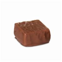 Milk Chocolate Caramel · Chewy caramel covered with rich milk chocolate. Serving size: 1/2 piece