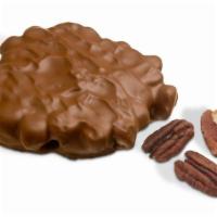Milk Chocolate Pecan Bear · Chewy caramel with pecans covered in rich milk chocolate. Serving size: 1/3 piece