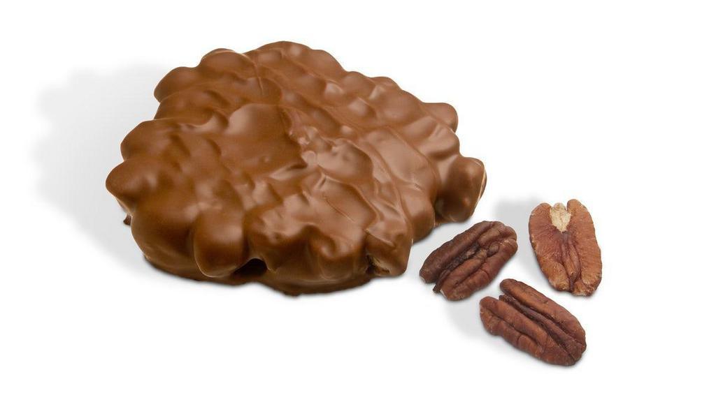 Milk Chocolate Pecan Bear · Chewy caramel with pecans covered in rich milk chocolate. Serving size: 1/3 piece