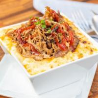 Bbq Mac N Cheese · Mac n cheese topped with your choice of brisket, chicken or pulled pork. Topped with BBQ sau...
