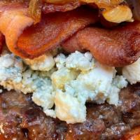 Blue Bacon Burger · 1/2 lb. beef patty grilled to order topped with bacon, caramelized onions and crumbled blue ...