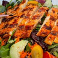 Chicken Breast Salad · Grilled boneless chicken breast served on a fresh garden salad, with cucumbers, tomato & red...