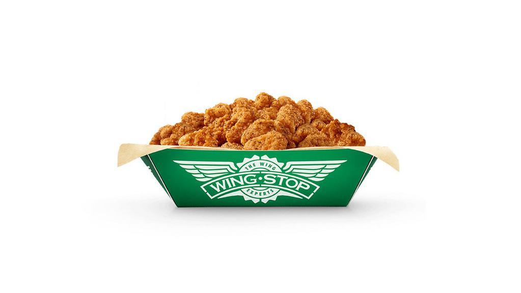 Large Thigh Bites · 1 large order of juicy, breaded, bite-sized boneless chicken in your favorite flavor.