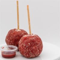Chili Limon Candy Apple · Candy apple rolled in tajin.