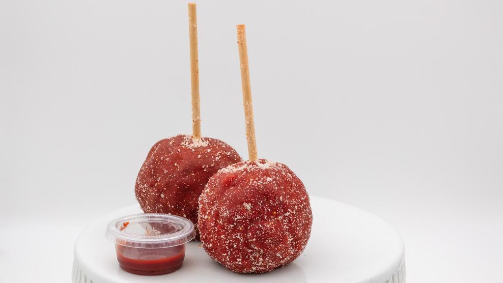 Chili Limon Candy Apple · Candy apple rolled in tajin.