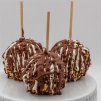 Tsunami Caramel Apple · Caramel apple with 4 nuts; almonds, cashews, peanuts and pecans; finished with white and mil...