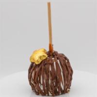 Chocolate Wish Caramel Apple · Caramel apple with a white, dark and milk chocolate drizzle.