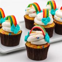 Confetti Rainbow · Vanilla bean cake with rainbow sprinkles.  Iced with buttercream, topped with rainbow candy ...