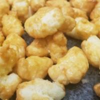 Caramel Corn Puff .25 · Tasty puffs of corn meal delicately coated with caramel and baked in the oven for the perfec...