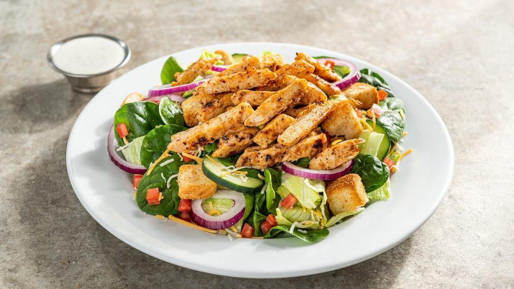 Chicken House Salad · Chicken, tomatoes, red onion, cucumber, shredded cheese, garlic croutons with choice of dressing.
