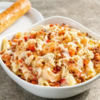Baked Seafood Pasta · Fresh baked crab, garlic shrimp, diced red bell pepper, bacon over a bed of penne pasta with...