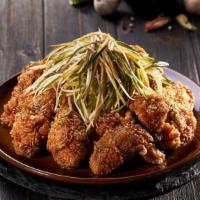Garlic Soy Spring Onion Chicken · Crispy chicken smothered in a soy glaze and topped with sliced spring onions mixed in our so...