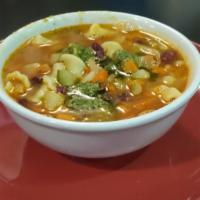 Minestrone · Italian vegetable soup, noodles, and pesto.