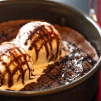 Deep Dish Brownie · A warm and gooey brownie baked in our signature mini deep dish pan topped with vanilla ice c...