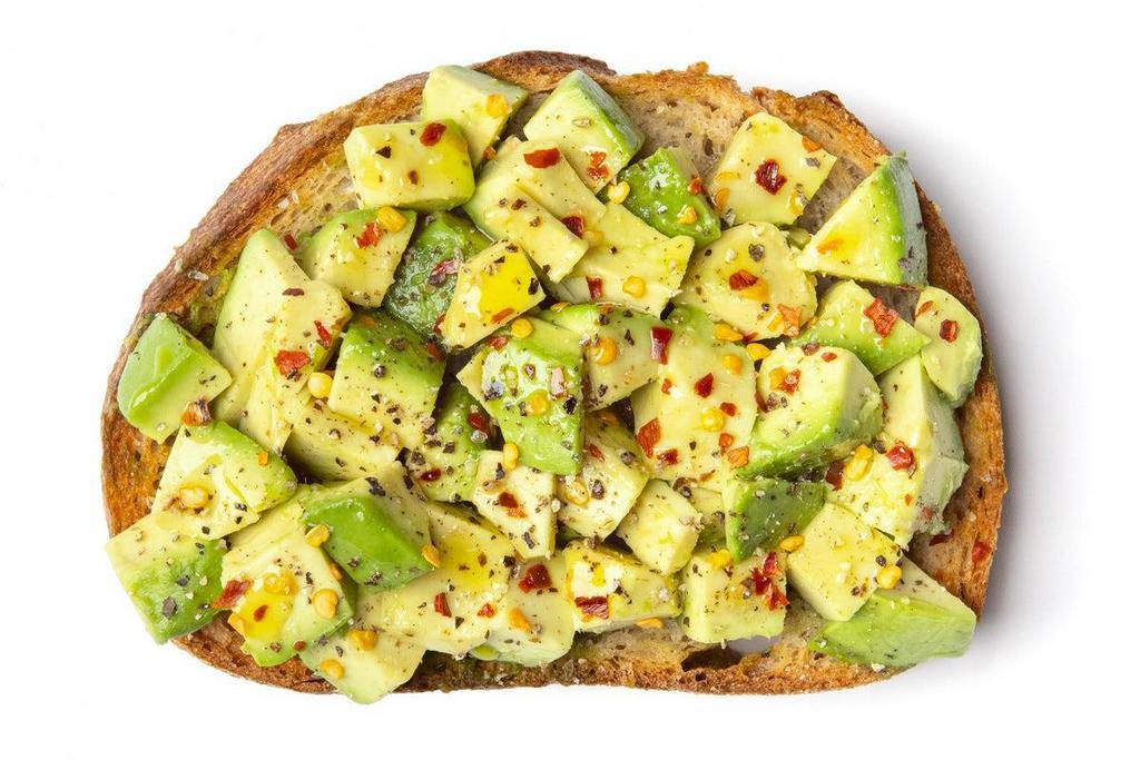 Classic Avocado Toast · Avocado drizzled with Lemon and Olive Oil, topped with chili flakes, Pink Himalayan Salt and pepper on a thick slice of sourdough toast.. Avocado, Chili Flakes, Lemon, Olive Oil, Pepper, Salt