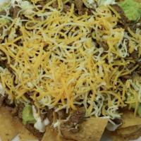 Small Carne Asada Chips · FRIES, CARNE ASADA, GUACAMOLE, SOUR CREAM, CHEESE,