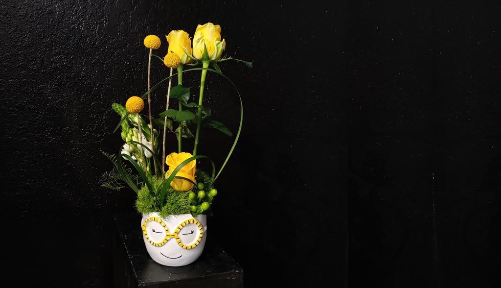 Charlie · When we look at Charlie we see an absolute darling and creative soul.  Their stylish glasses and sweet demeanor make their smile contagious, and they are one of our new favorite friends.  This arrangement of yellows and whites would fit so nicely on a vanity or desk area.  5