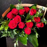 Dozen Roses - Wrapped · 12 red roses wrapped with a mix of premium greenery. **Sold out of eco-fresh stem wrap. ***
...