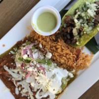 Rosa Combo · Choice of blackened chicken or steak taco combined with choice of Mexico city chicken enchil...