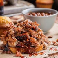 Georgia Chopped Pork Platter · Our award-winning pork is smoked for up to 12 hours and chopped to order. Served with choice...