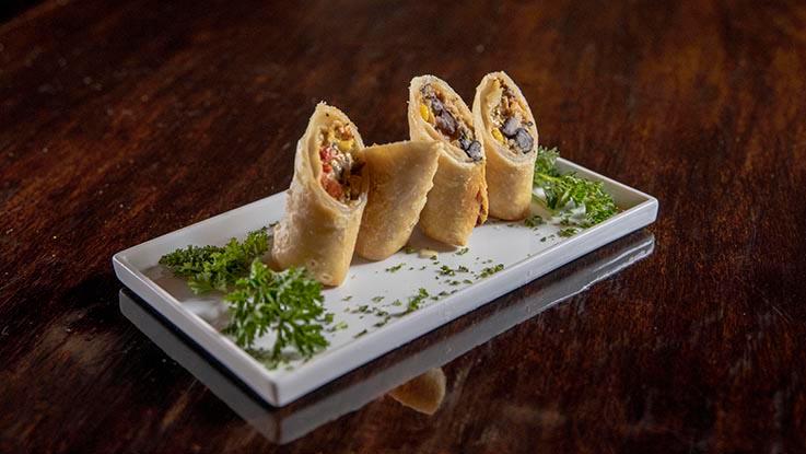 Southwest Rolls · Smoked chicken, black beans, corn, jalapeno jack cheese, red peppers & spinach wrapped in a flour tortilla.