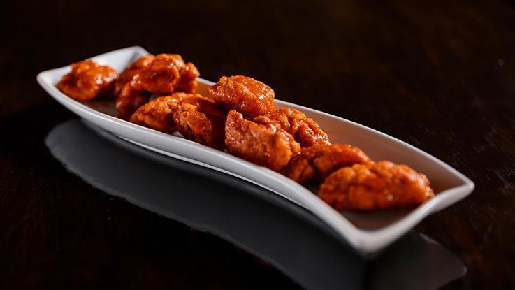 Boneless Wings  · All breast meat tossed in flavorful sauces. Choose from tangy, bbq or sweet thai chili.