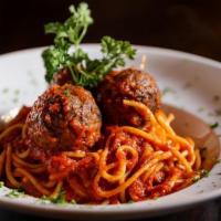 Spaghetti · Spaghetti w/ tomatoes and roasted garlic in a fresh marinara sauce.