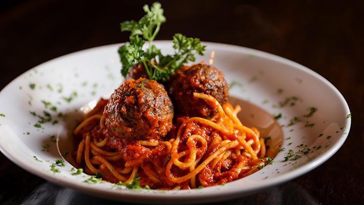 Spaghetti · Spaghetti w/ tomatoes and roasted garlic in a fresh marinara sauce.