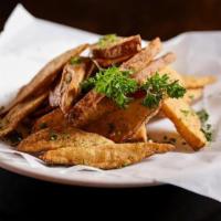 Chicken & Wedges · Cut fresh daily bone-in chicken fried to a golden brown crisp served with potato wedges.