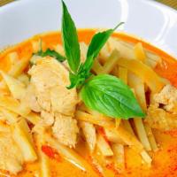Red Curry With Jasmine Rice · Bamboo shoots, bell peppers and basils in medium red curry with coconut milk