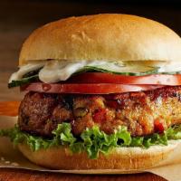 Salmon Burger & Tots Box · Sustainable Pan Seared Alaskan Wild Salmon, Blackened Seasoning, Lettuce, Tomato, Tartar Sau...