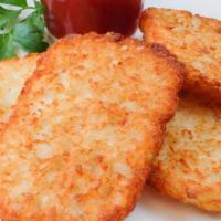 Hash Brown Cakes · Our Hash Browns are deliciously tasty and perfectly crispy. These shredded potato hash brown...