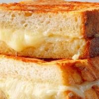 Grilled Cheese · Mom’s famous recipe made with American cheese & grilled to perfection on Thick Texas Toast