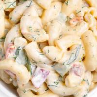 Macaroni Salad · Our Macaroni Salad is made with plump elbow macaroni and a sweet and spiced mayonnaise dress...