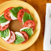 Caprese · Contains raw egg. Fresh mozzarella with sliced Roma tomatoes, fresh basil, and balsamic vina...