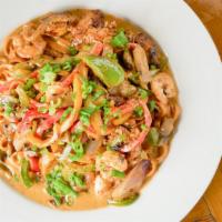 Pasta New Orleans · Spicy. Cajun seared chicken and shrimp, cajun cream sauce, red onions, bell peppers (green, ...