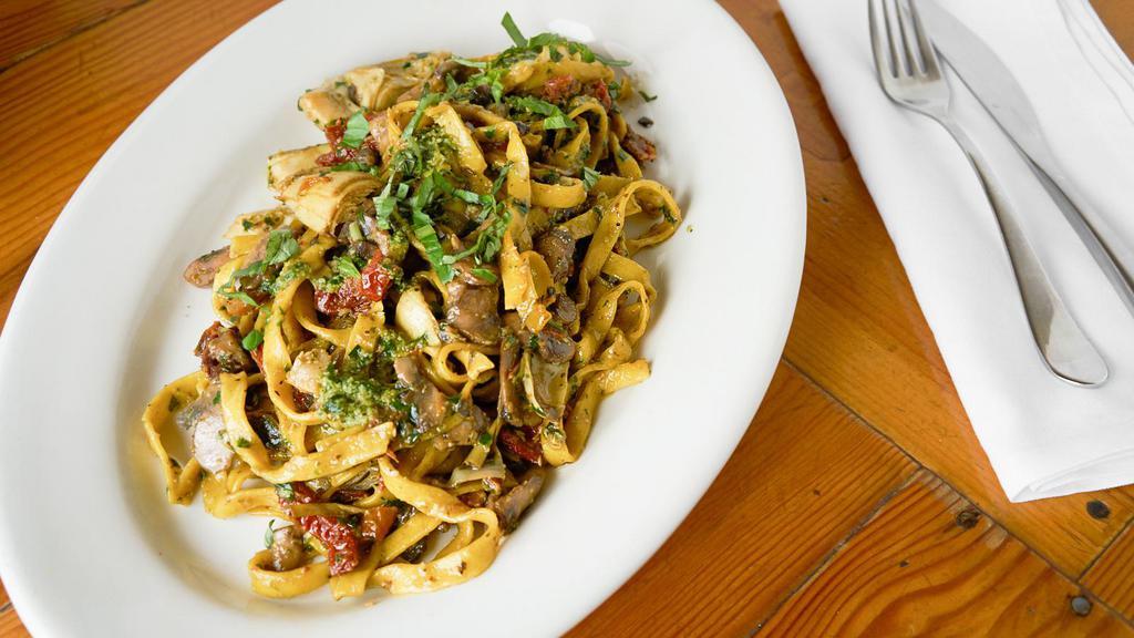 Mediterranean · Artichoke hearts, sundried tomatoes, sautéed mushrooms and pesto tossed with lemon pepper fettuccine. (contains pine nuts)