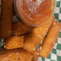 Mozzarella Sticks · Six in each order served with meat sauce.