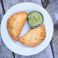 Grass-Fed Beef Empanada · Fresh, grass-fed ground beef, potatoes, onions, garlic and spices. We recommend our fresh ho...