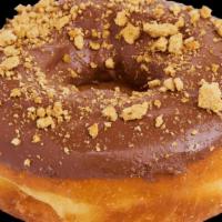 Nutella Raised · Nutella topped raised donut with graham cracker crumbles.