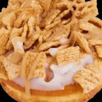 Cinnamon Toast Crunch Raised · Vanilla icing dipped in Cinnamon Toast Crunch cereal.