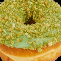 Matcha Tea Raised · Matcha flavored icing with matcha crumbles on top.